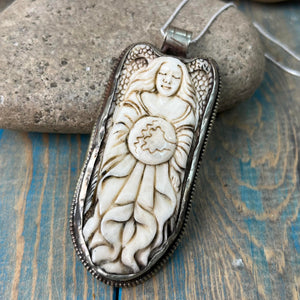 Bone carved pendant necklace