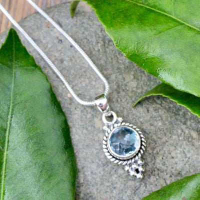 Blue Topaz Faceted Round Pendant